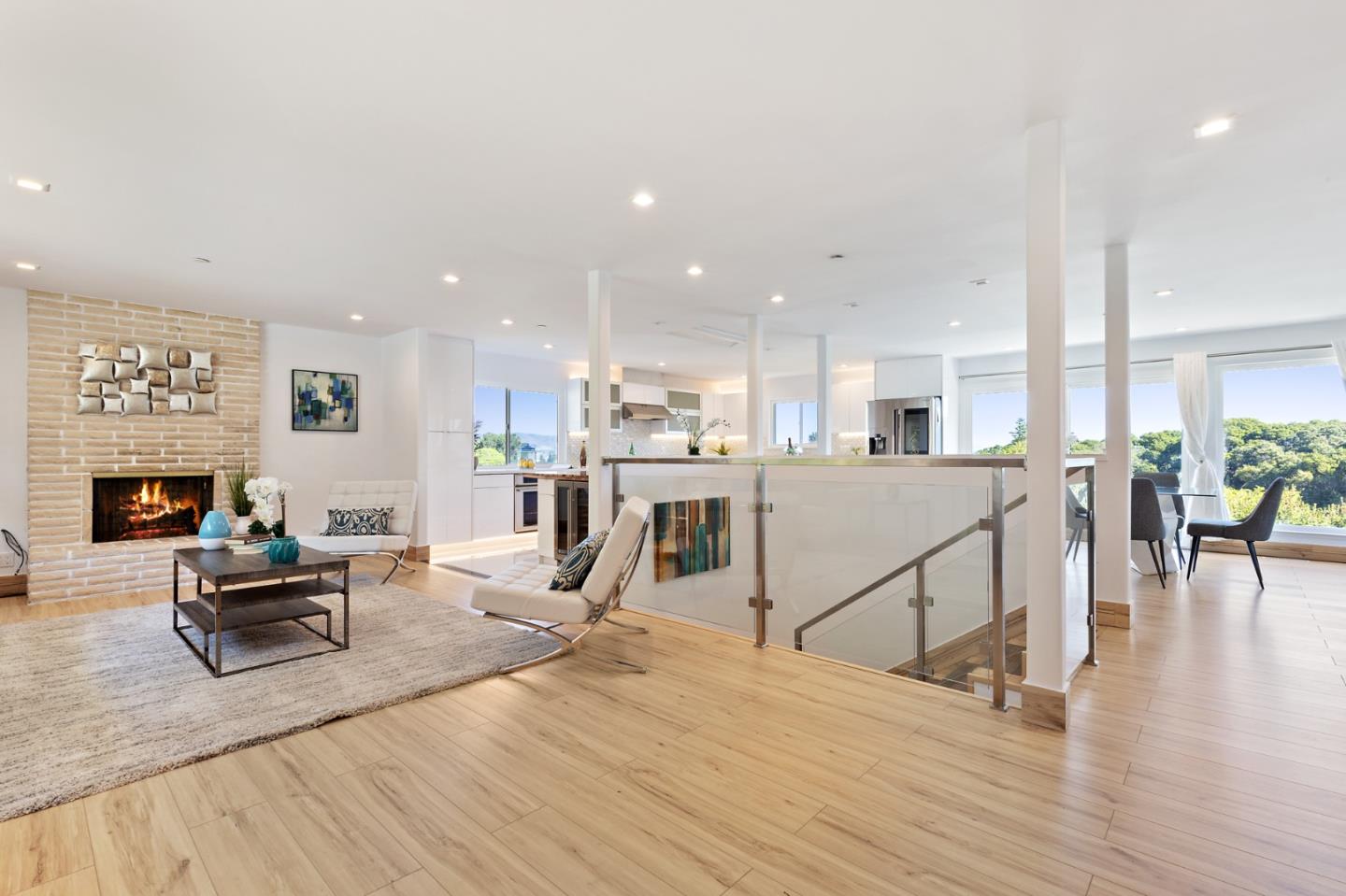 22 Bertocchi Lane Millbrae, CA 94030 - Photo 6 of 50 a living room with stainless steel appliances furniture wooden floor and a kitchen view