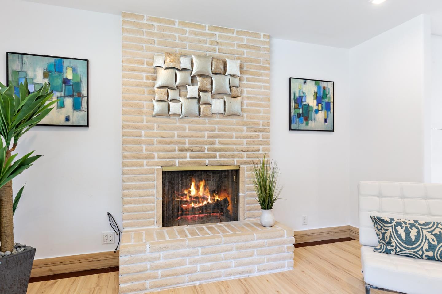 22 Bertocchi Lane Millbrae, CA 94030 - Photo 9 of 50 a living room with furniture and a fireplace