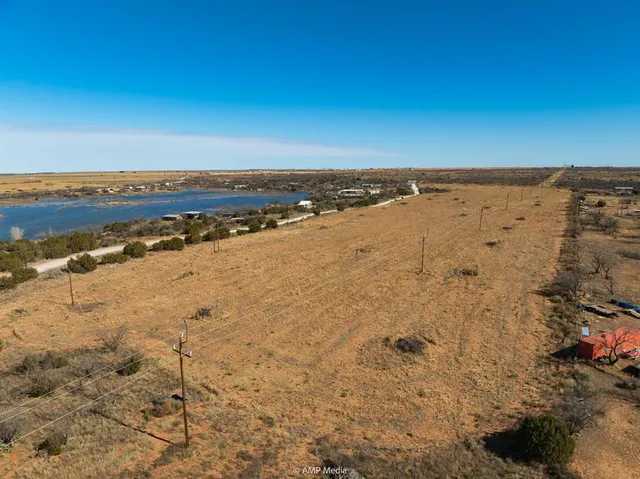 an aerial view of beach and ocean