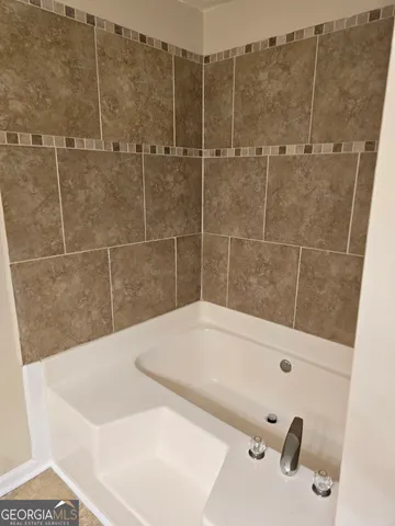 a bathroom with a tub