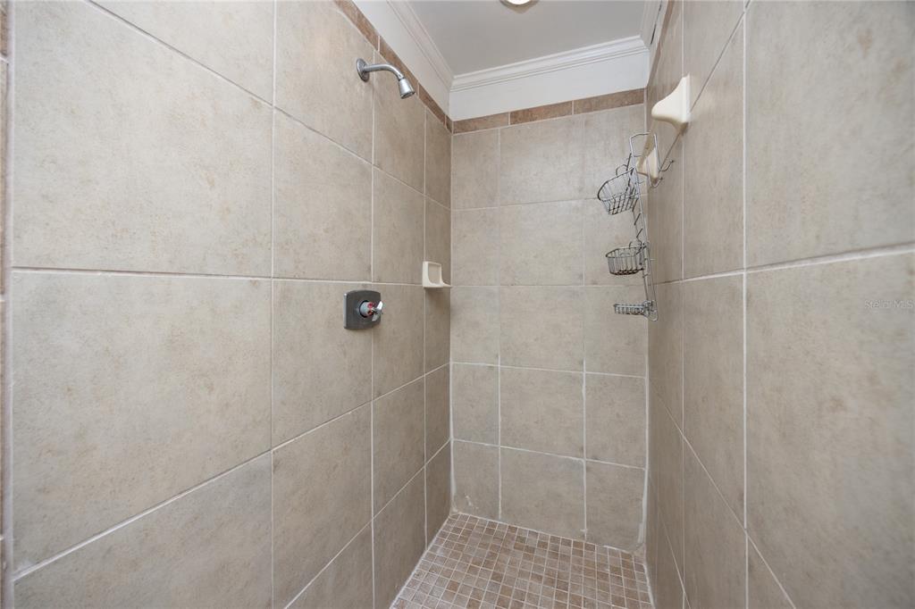 2147 Northwest 7th Place Gainesville, FL 32603 - Photo 35 of 50 a bathroom with a shower