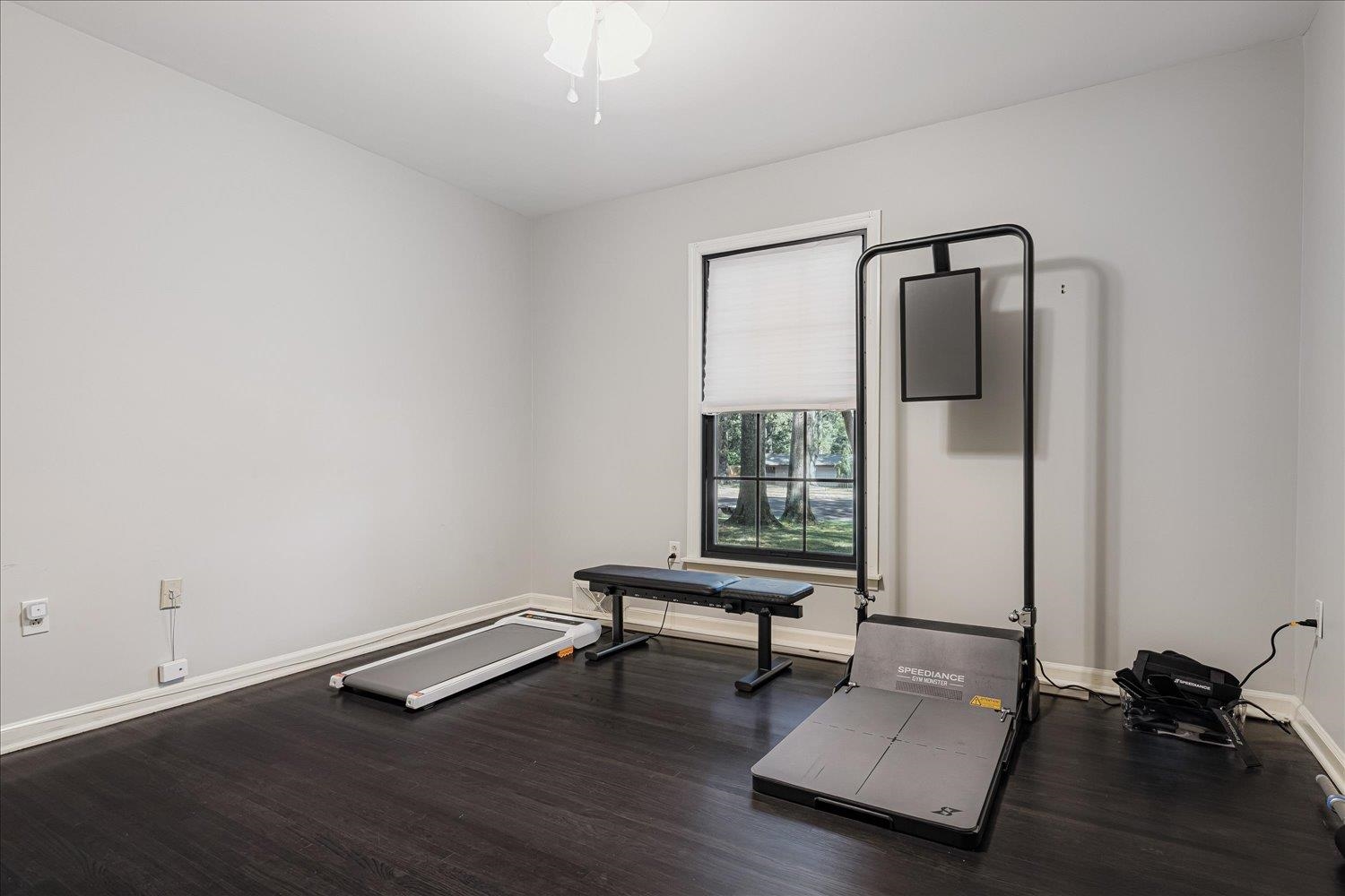 5429 Walnut Grove Road Memphis, TN 38120 - Photo 23 of 37 a living room with furniture and a window