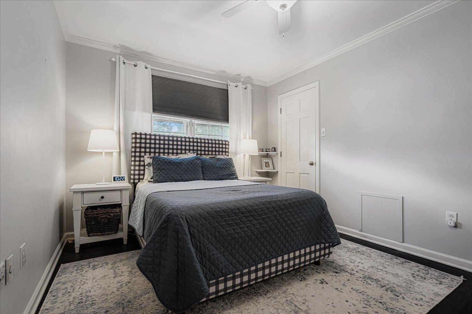 5429 Walnut Grove Road Memphis, TN 38120 - Photo 26 of 37 a bedroom with a bed and a window