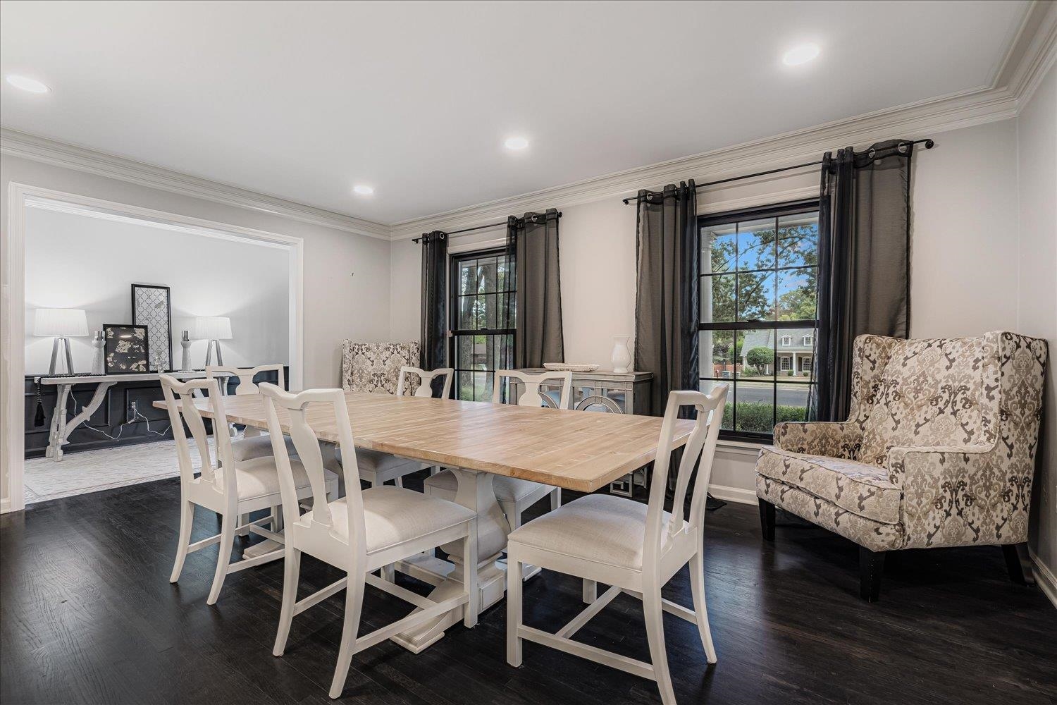5429 Walnut Grove Road Memphis, TN 38120 - Photo 6 of 37 a view of a dining room with furniture and wooden floor