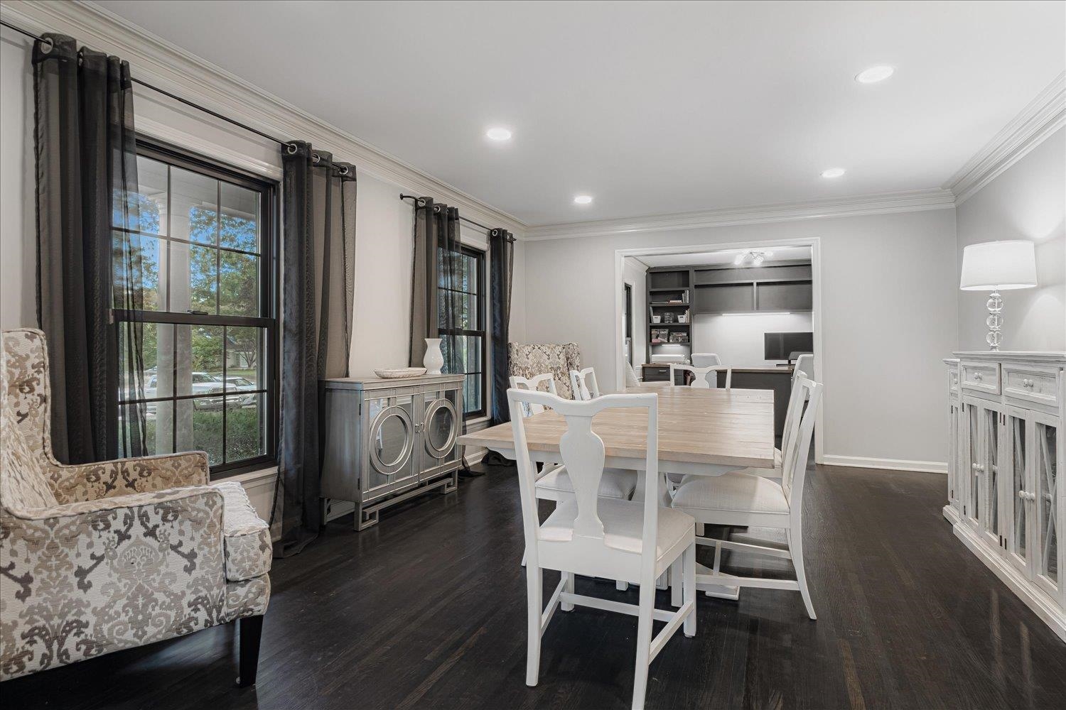 5429 Walnut Grove Road Memphis, TN 38120 - Photo 7 of 37 a dining room with furniture and wooden floor