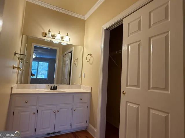 a bathroom with a toilet and a bathtub