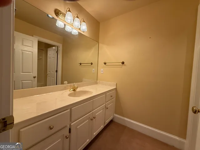 a bathroom with a toilet and a bathtub
