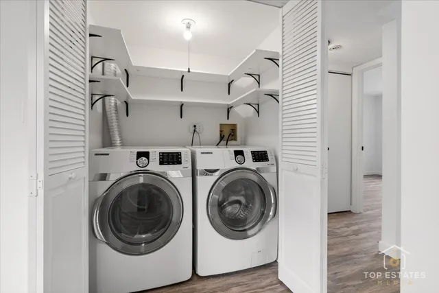 a utility room with dryer and washer