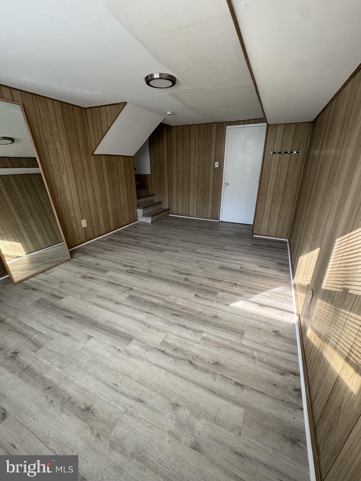 7410 Dickenson Street Springfield, VA 22150 - Photo 11 of 14 Bright, airy space with wood accents.