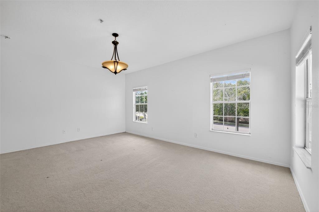 6071 Strada Isle Way Orlando, FL 32835 - Photo 13 of 29 a view of an empty room with a window