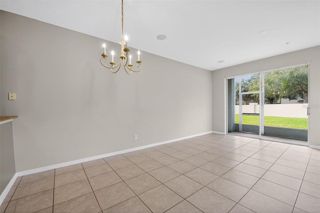 6071 Strada Isle Way Orlando, FL 32835 - Photo 18 of 29 a view of an empty room with a window