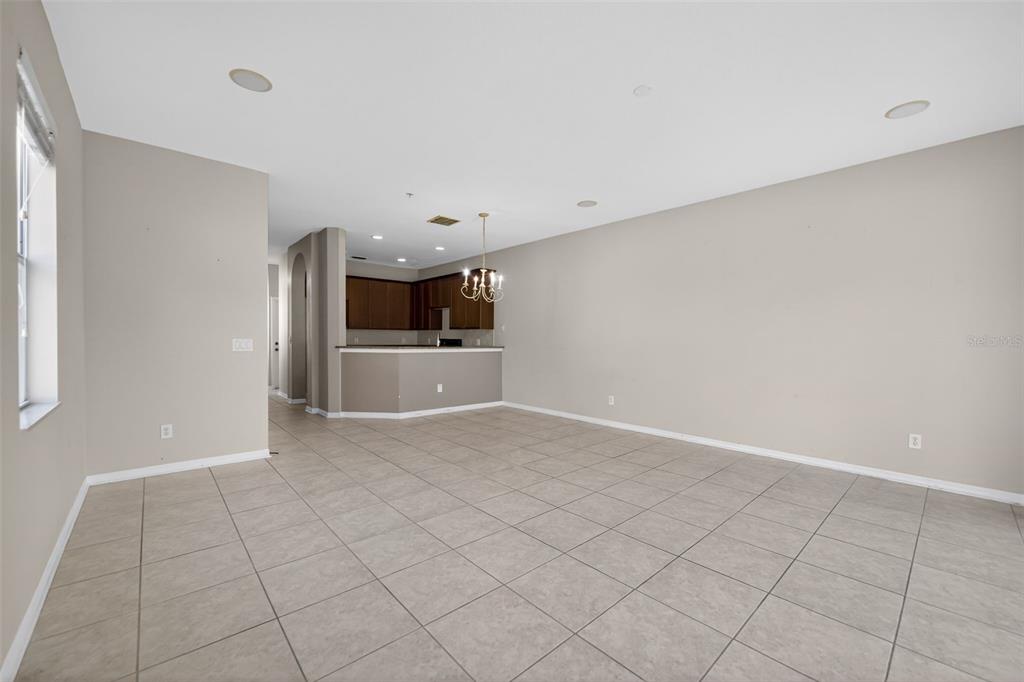 6071 Strada Isle Way Orlando, FL 32835 - Photo 10 of 29 a view of a kitchen with a sink and a refrigerator