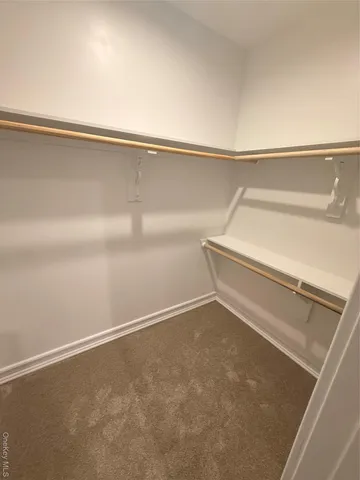 a view of small space with racks on the wall