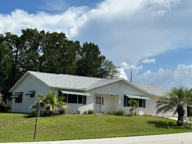 8602 Southwest 116th Place Road Ocala, FL 34481 - Photo 1 of 46 a front view of house with yard and green space