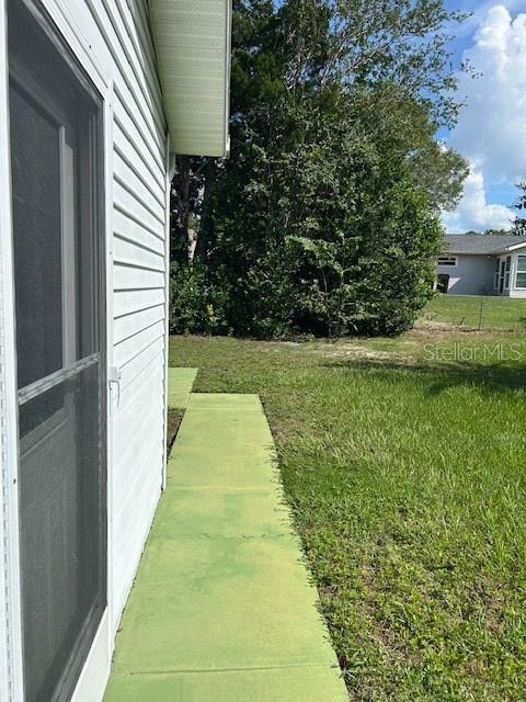 8602 Southwest 116th Place Road Ocala, FL 34481 - Photo 33 of 46 a view of a backyard with plants