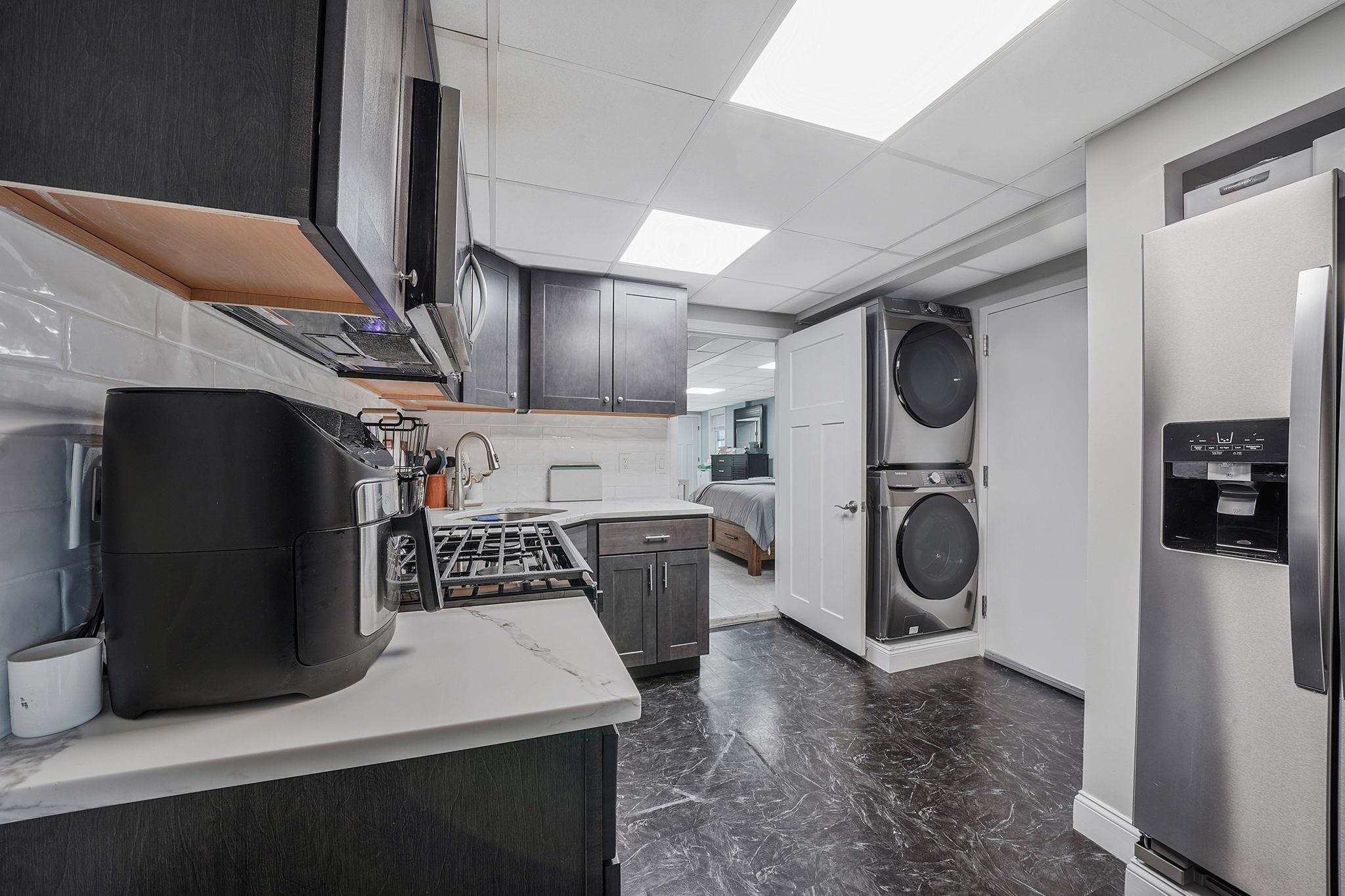 28 West 13th Road Queens, NY 11693 - Photo 16 of 37 a view of a kitchen with washer and dryer