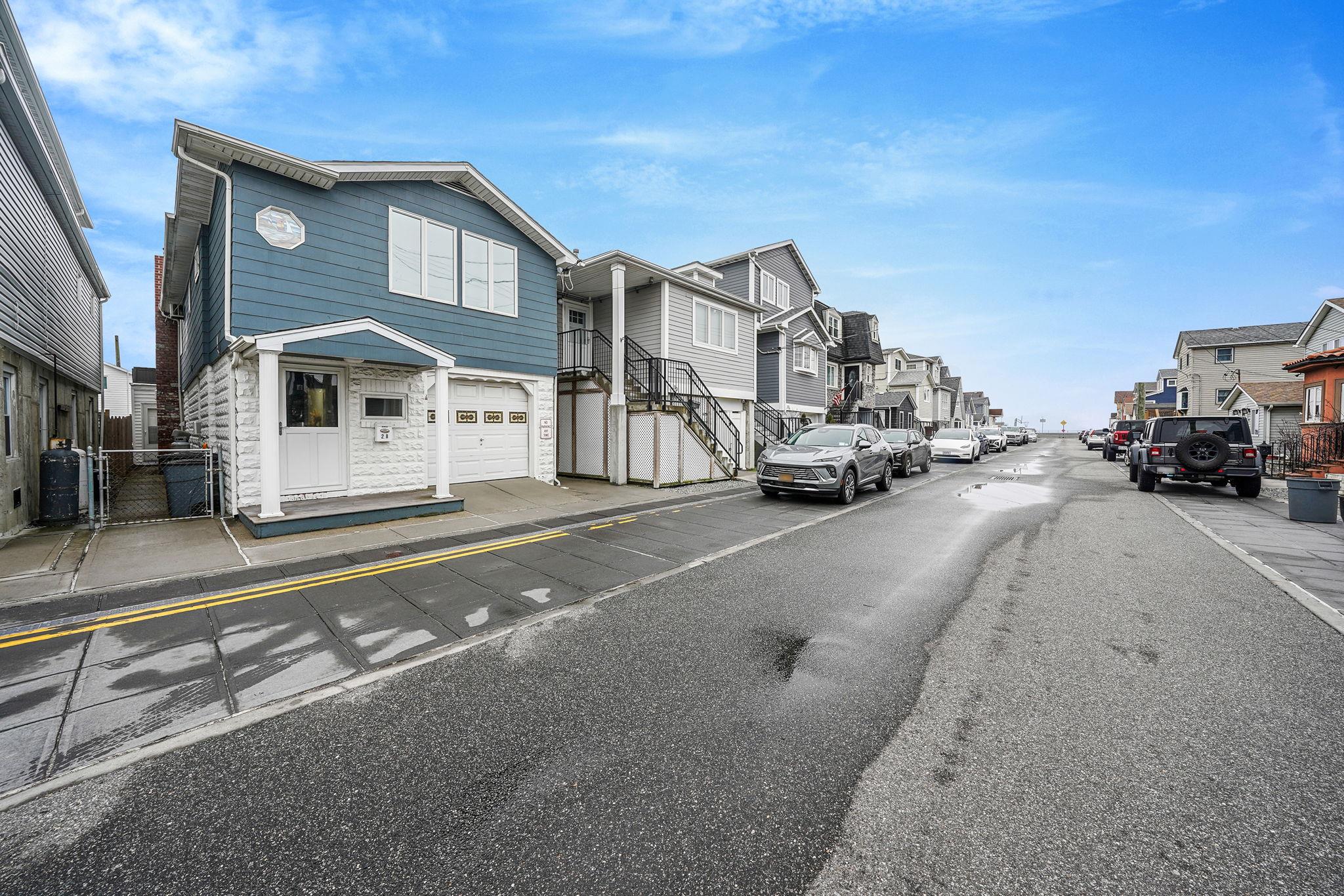 28 West 13th Road Queens, NY 11693 - Photo 2 of 37 a view of a street with a building