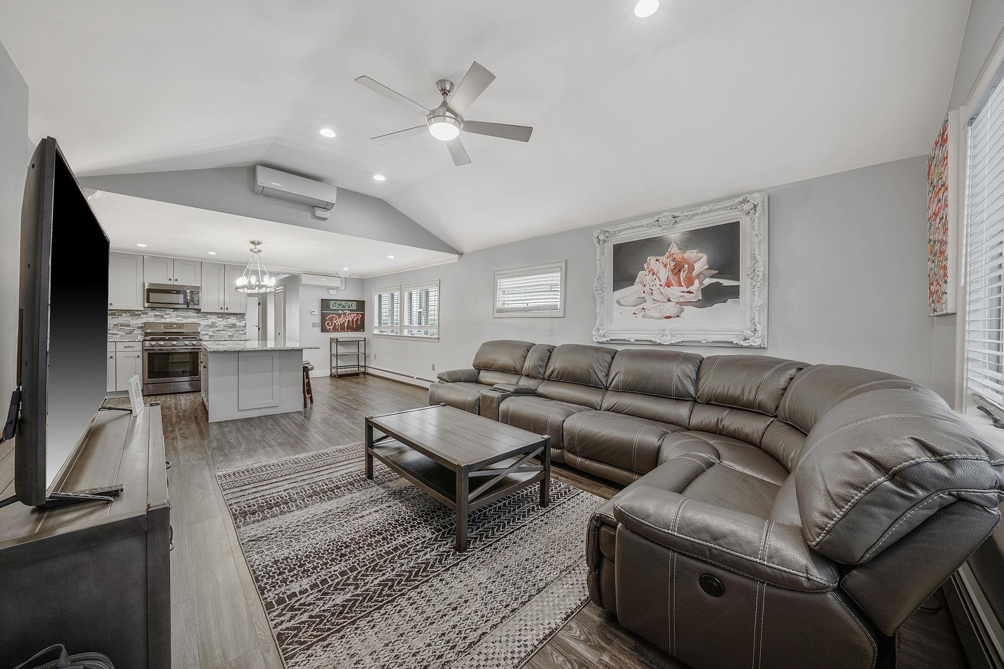 28 West 13th Road Queens, NY 11693 - Photo 25 of 37 a living room with furniture and a view of kitchen