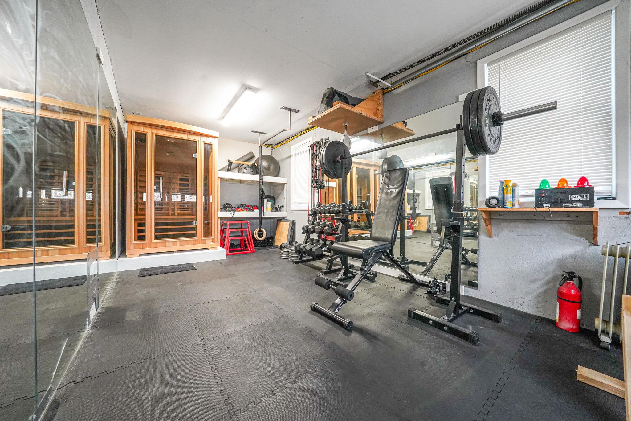 28 West 13th Road Queens, NY 11693 - Photo 34 of 37 a view of a room with gym equipment