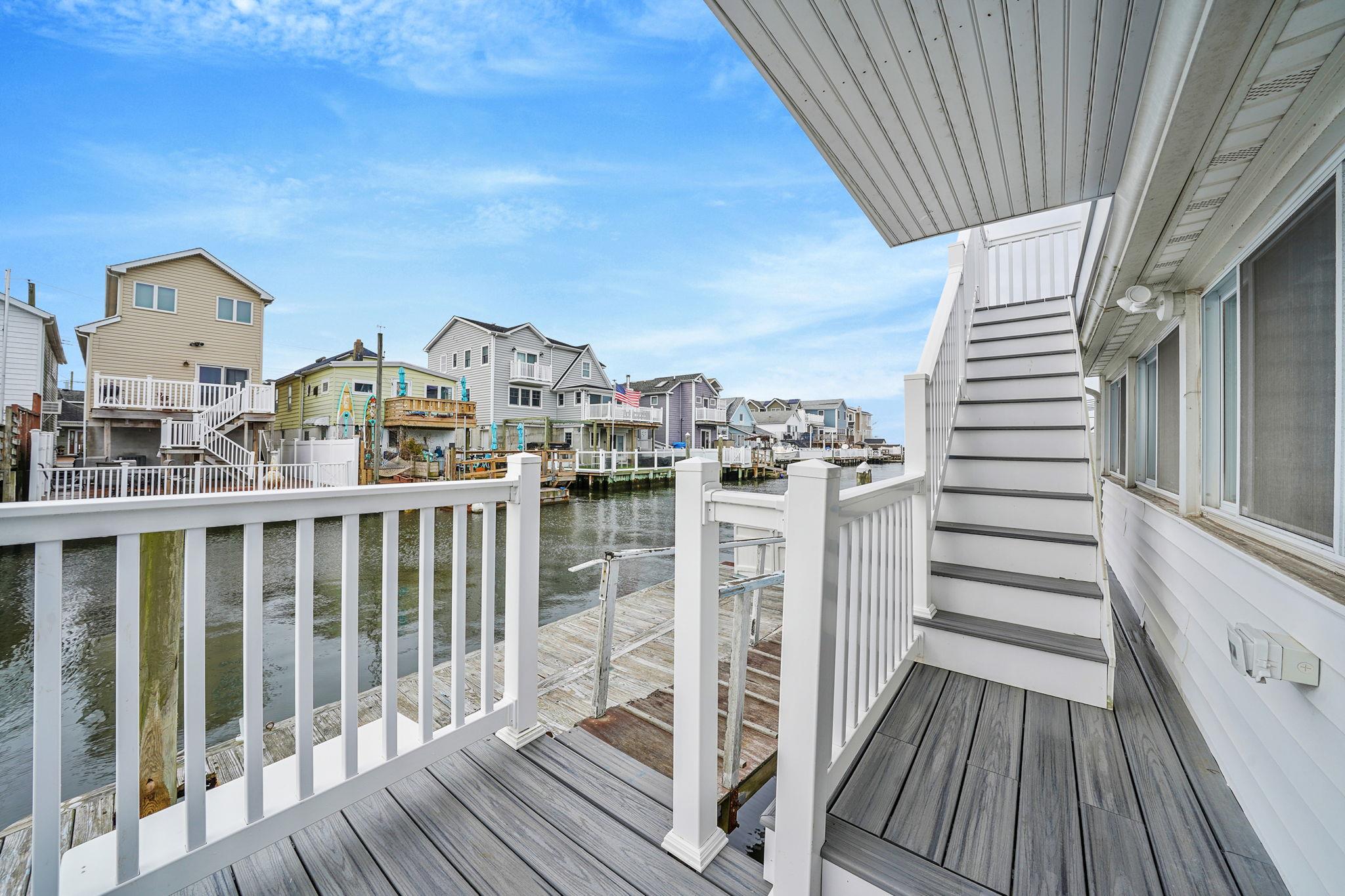 28 West 13th Road Queens, NY 11693 - Photo 4 of 37 a view of a balcony with wooden floor