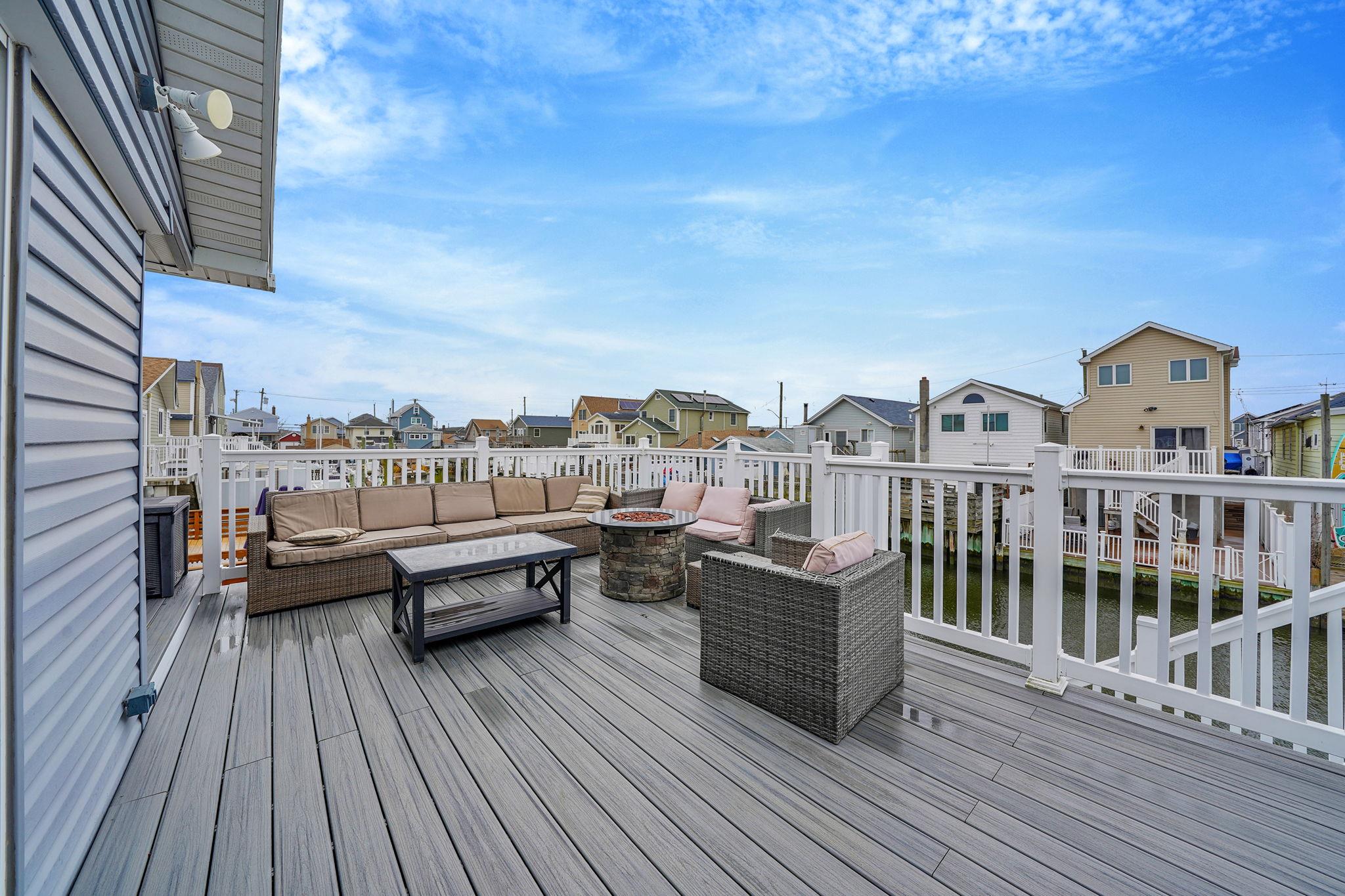 28 West 13th Road Queens, NY 11693 - Photo 5 of 37 a view of roof deck with patio