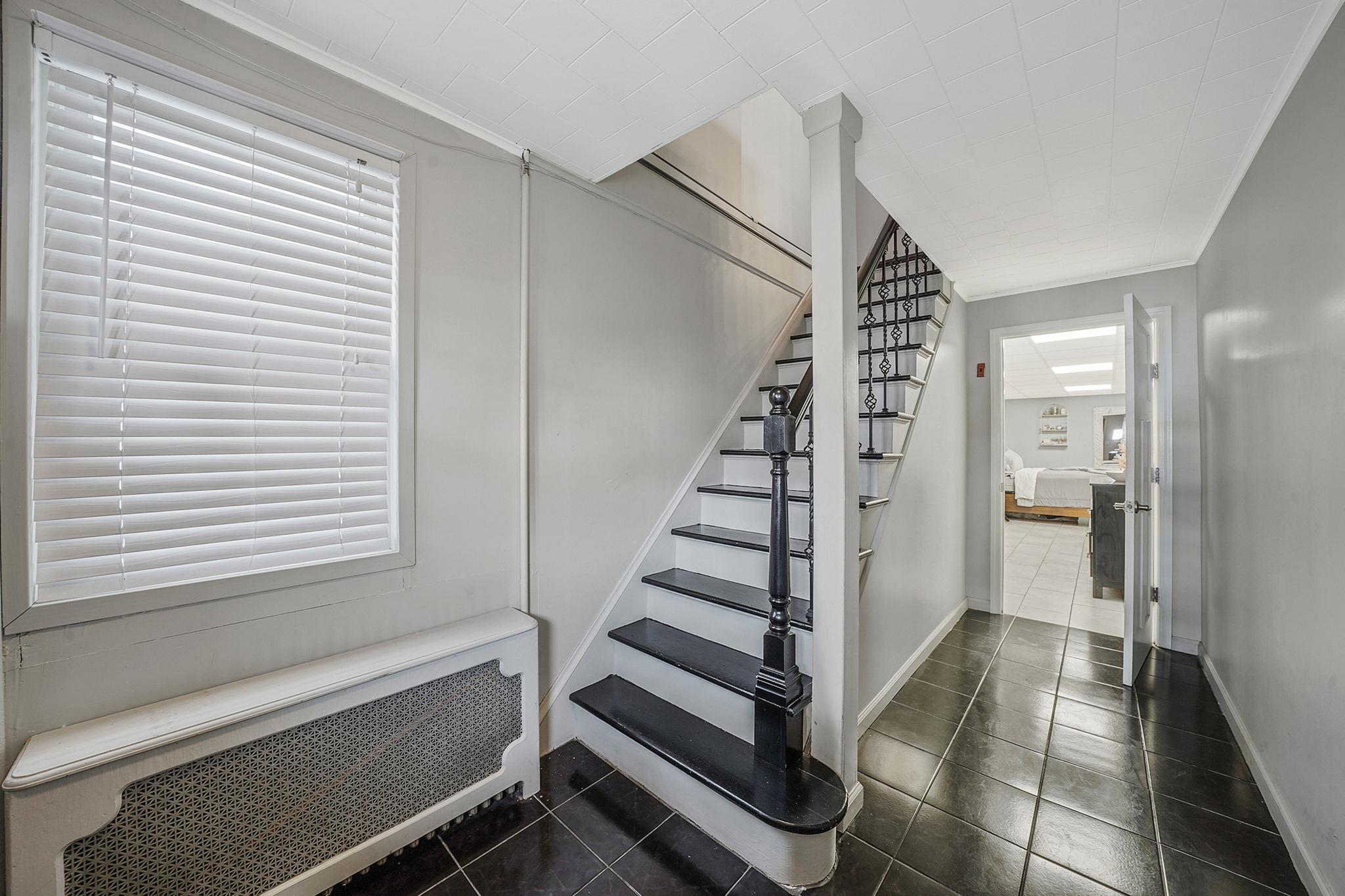 28 West 13th Road Queens, NY 11693 - Photo 7 of 37 a view of entryway and hall with wooden floor