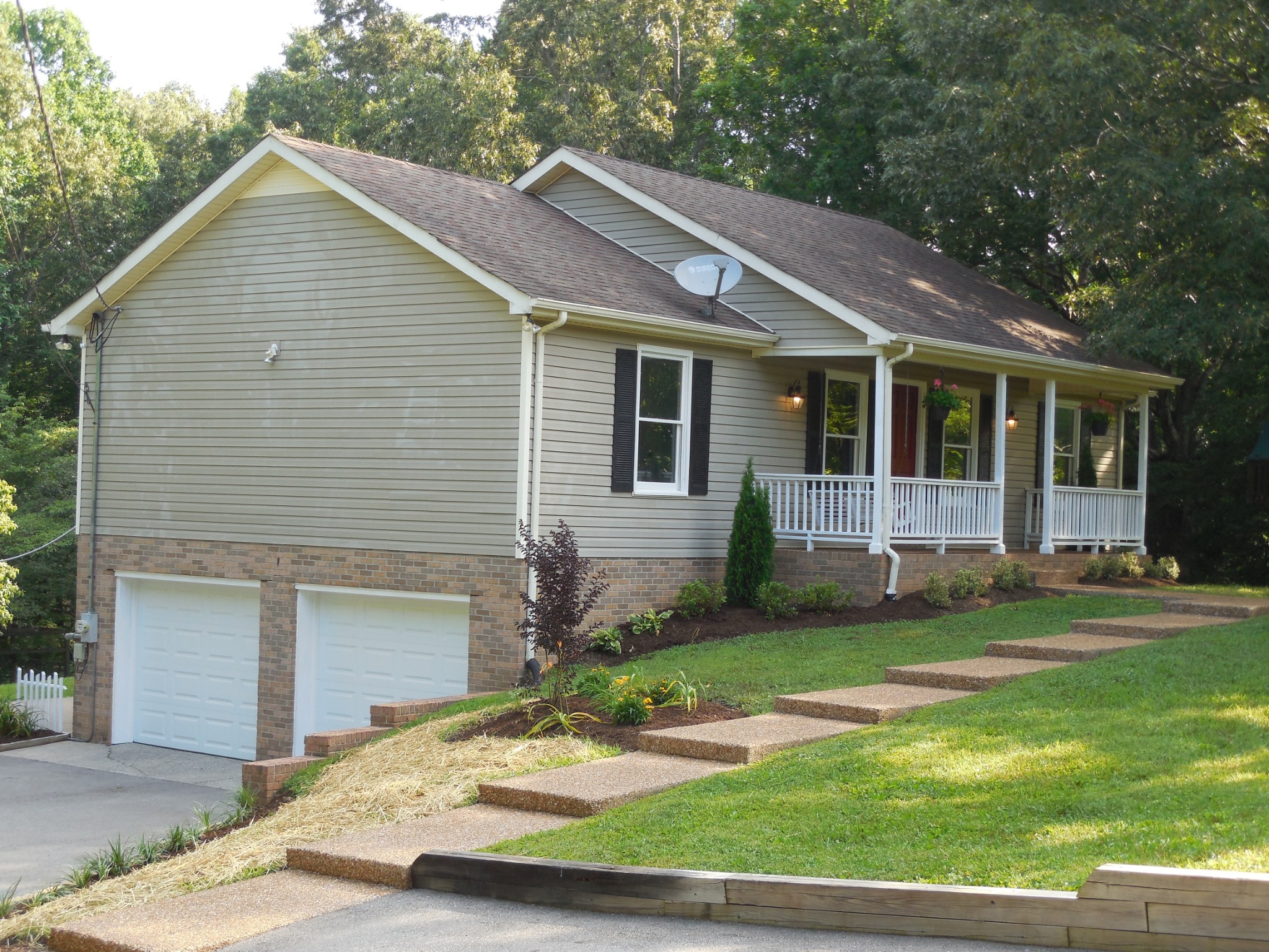 7397 Forest Glenn Road Fairview, TN 37062 - Photo 1 of 16 a view of a house with a yard and plants
