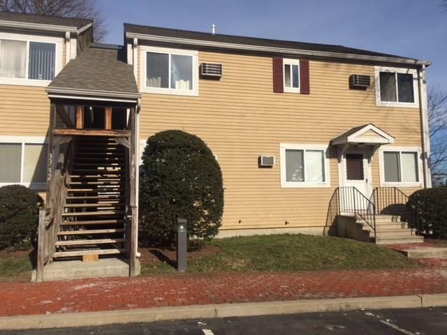 135 Flax Hill Road, Unit 36 Norwalk, CT 06854 - Photo 1 of 1 a front view of a house with garden