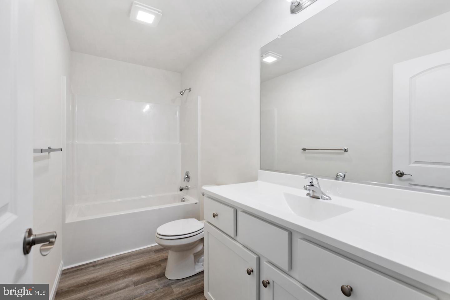 144 Pratts Branch Road Felton, DE 19943 - Photo 17 of 24 a bathroom with a sink a toilet and shower