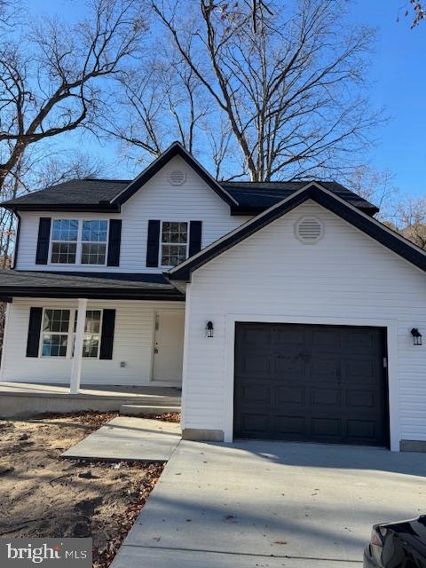 144 Pratts Branch Road Felton, DE 19943 - Photo 2 of 24 a house with trees in the background