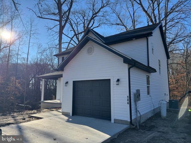 144 Pratts Branch Road Felton, DE 19943 - Photo 3 of 24 a yellow house with trees in front of it