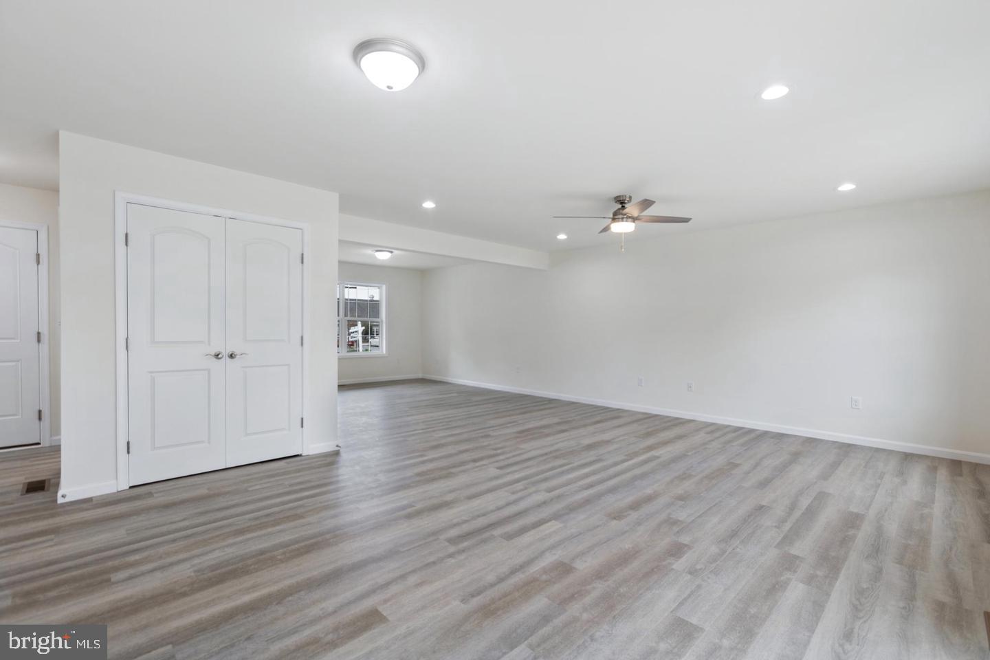 144 Pratts Branch Road Felton, DE 19943 - Photo 10 of 24 wooden floor in an empty room with a window