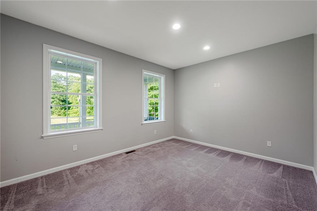 700 Springfield Road Penn Run, PA 15765 - Photo 11 of 25 an empty room with windows
