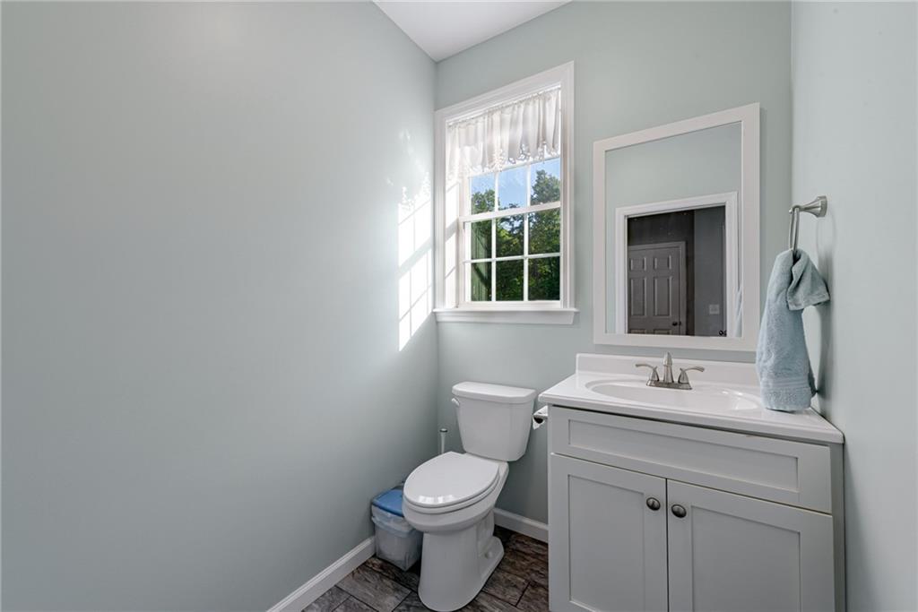 700 Springfield Road Penn Run, PA 15765 - Photo 14 of 25 a bathroom with a toilet sink and mirror