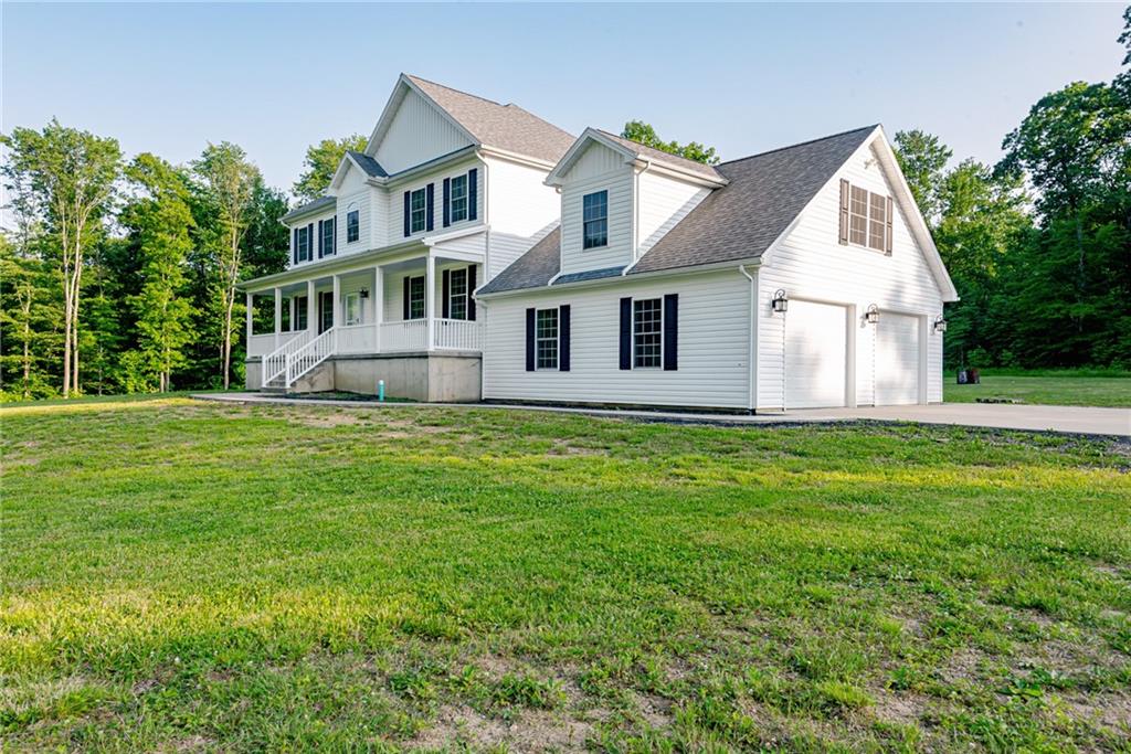 700 Springfield Road Penn Run, PA 15765 - Photo 23 of 25 a front view of house with yard and green space