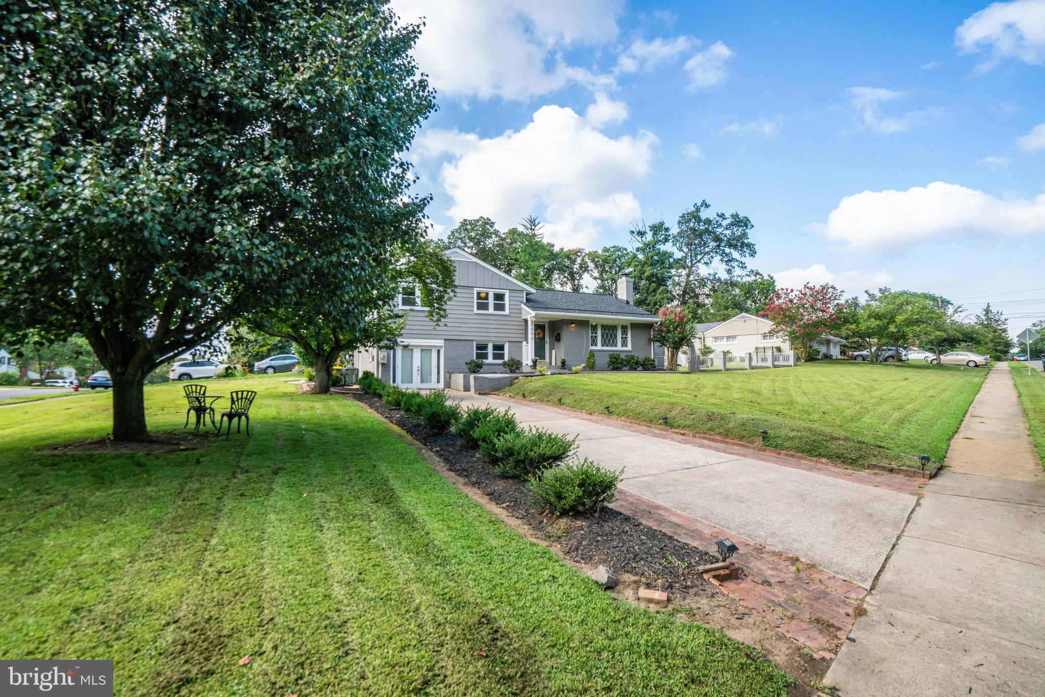 5904 Atteentee Road Springfield, VA 22150 - Photo 3 of 51 a view of a house with a big yard