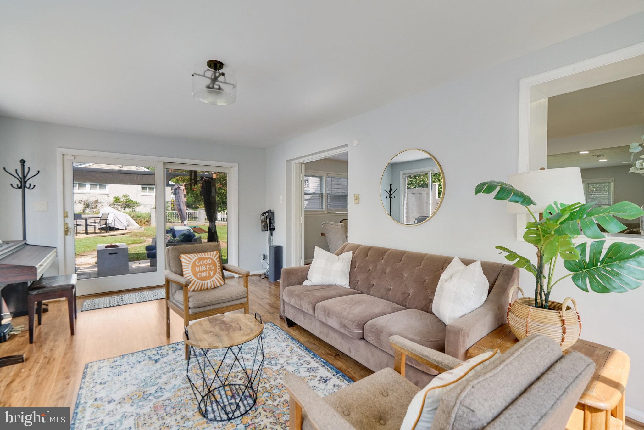5904 Atteentee Road Springfield, VA 22150 - Photo 46 of 51 a living room with furniture and a large window
