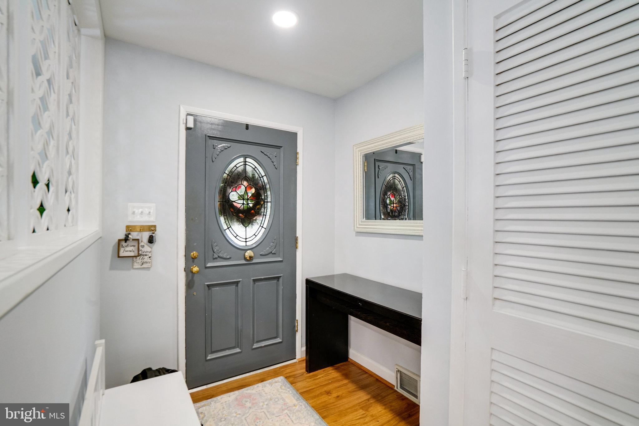 5904 Atteentee Road Springfield, VA 22150 - Photo 5 of 51 a bedroom with a bed and a dresser
