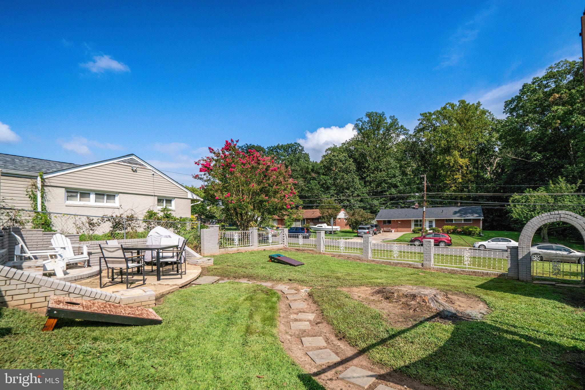 5904 Atteentee Road Springfield, VA 22150 - Photo 51 of 51 a front view of a house with garden
