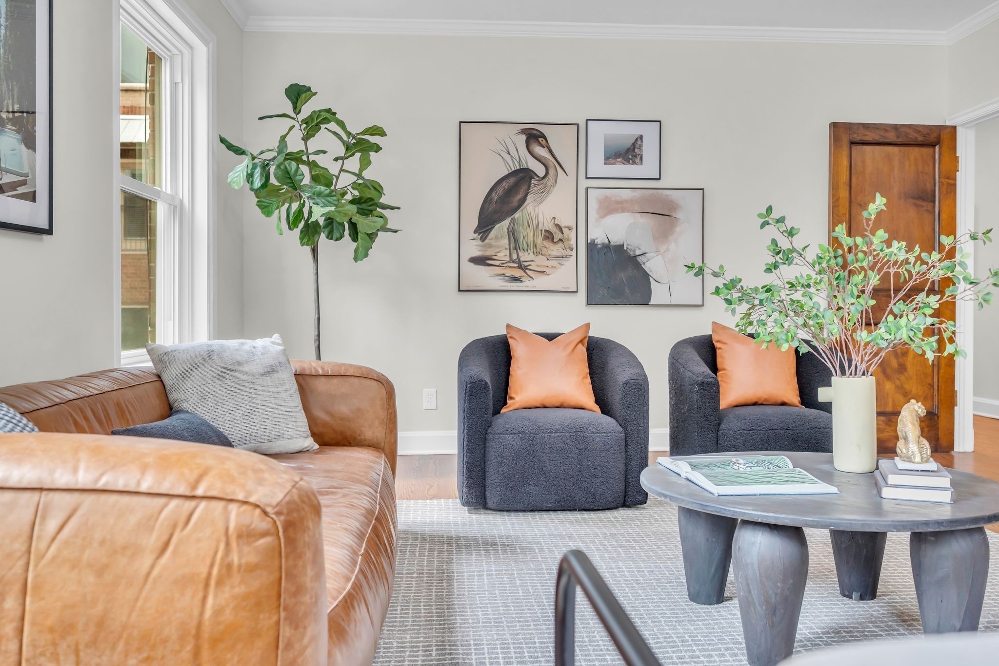 2003 Convent Place, Unit 1 Nashville, TN 37212 - Photo 1 of 34 a bedroom with furniture and a potted plant