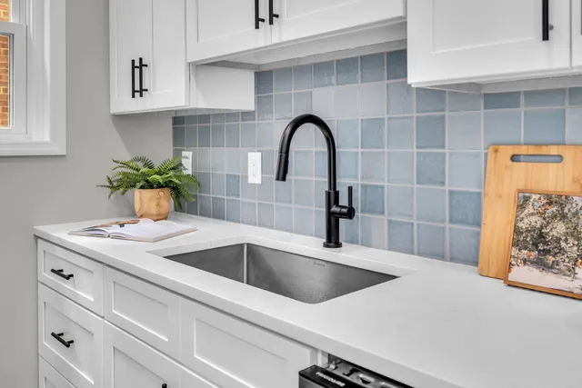 a bed room with a bed and a window