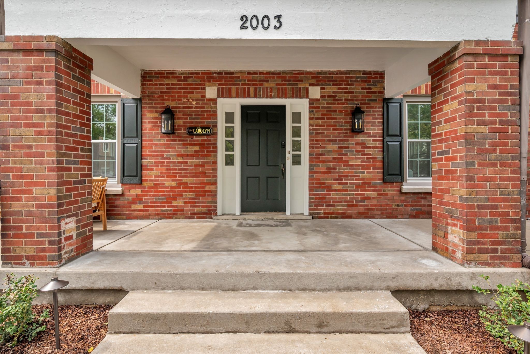 2003 Convent Place, Unit 1 Nashville, TN 37212 - Photo 5 of 34 a front view of a building with windows