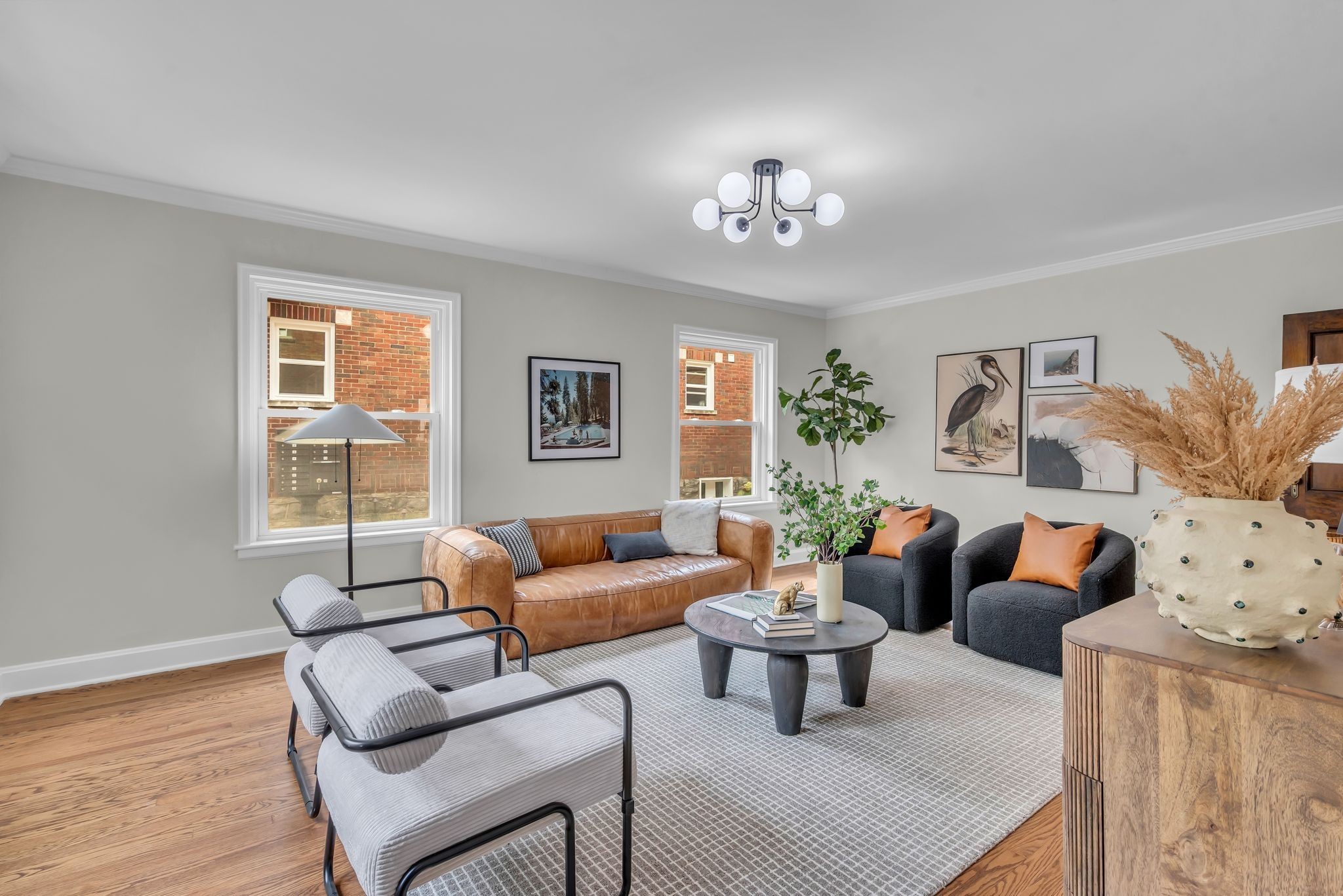 2003 Convent Place, Unit 1 Nashville, TN 37212 - Photo 9 of 34 a living room with furniture potted plant and a window