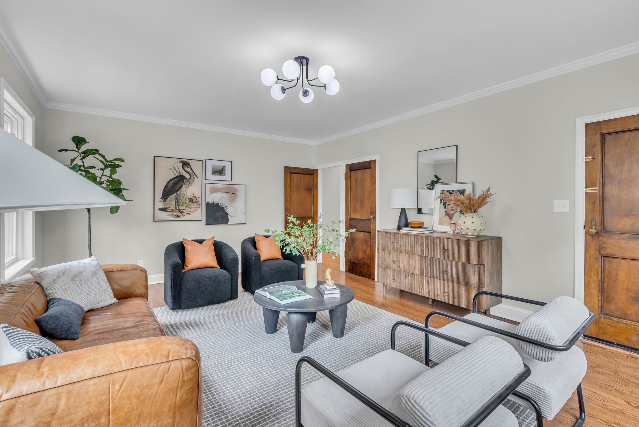 2003 Convent Place, Unit 1 Nashville, TN 37212 - Photo 10 of 34 a living room with furniture and a chandelier