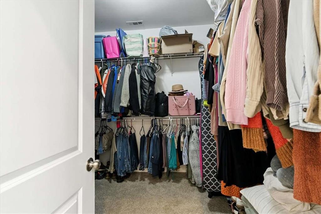 62 Joe Rowell Road Buchanan, GA 30113 - Photo 44 of 63 a view of walk in closet with clothes and shoes