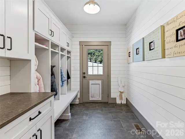 a bedroom with a bed and furniture