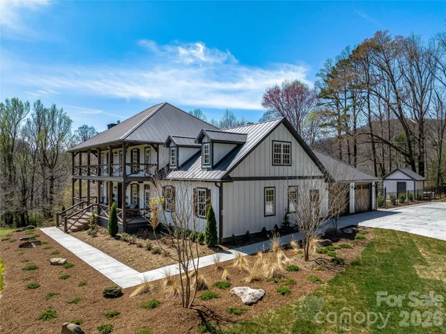 a house with trees in the background