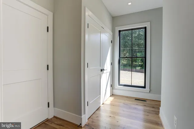a view of entryway with wooden floor