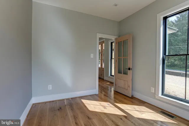 an empty room with windows