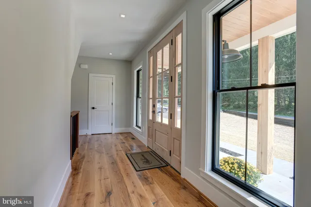 a view of a room with a large window